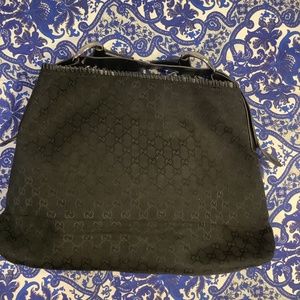 Large black hobo bag with chunky silver hardware